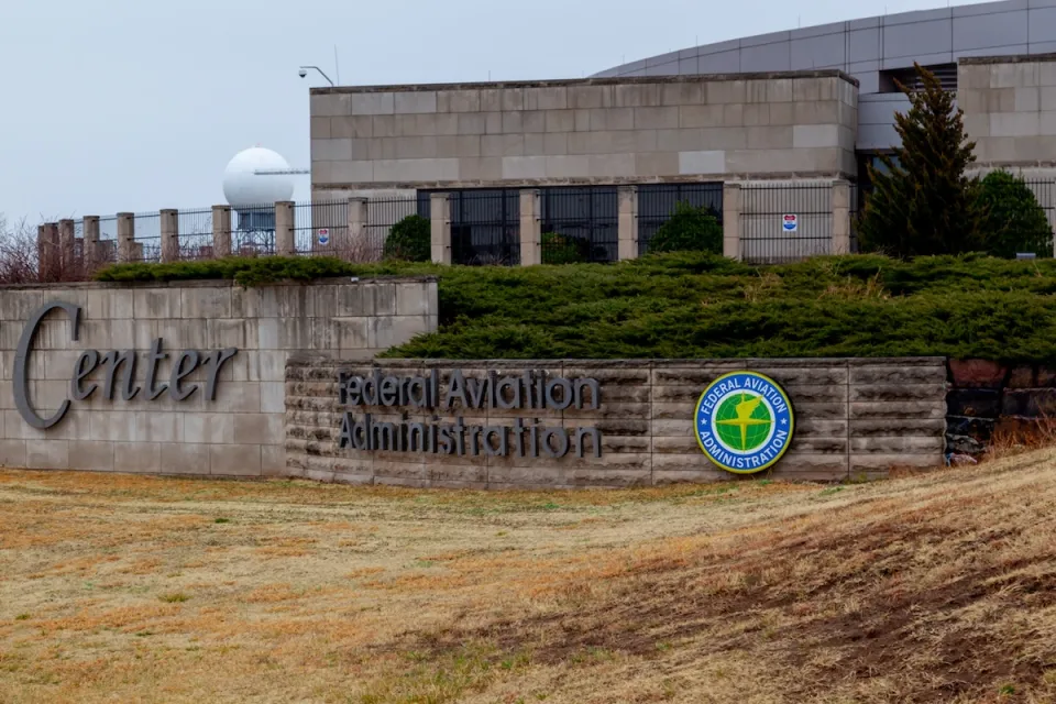 Concrete Federal Aviation Administration office building in Oklahoma City, OK on an overcast day.